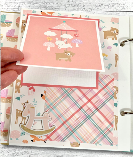 Baby Girl Scrapbook Album Page with cute animals, a mobile, a rocking horse, and pretty plaid paper