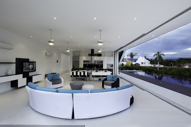Modern living room with curved furniture 