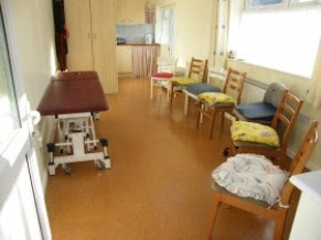 Treatment room  with chairs in layout for teaching.