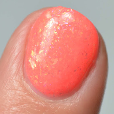 coral flakie nail polish close up swatch