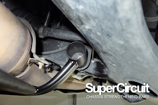 SuperCircuit front lower brace bar installed to the Subaru XV/ Subaru Crosstrek for lesser front lower chassis flex.