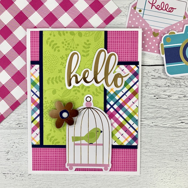 Hello handmade card with flowers, a birdcage, and gold accents