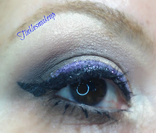 soft_brown_with_purple_glitter_makeup