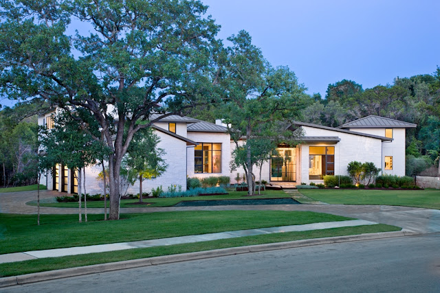 Photo of urban contemporary home as seen from the street