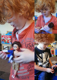 4 and 6 year old boys playing with dolls