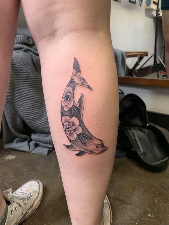 Dolphin-made-by-Flowers-Leg-Tattoo