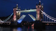 The most interesting fact about Tower Bridge is that it opens for ships with . (openbridge night)