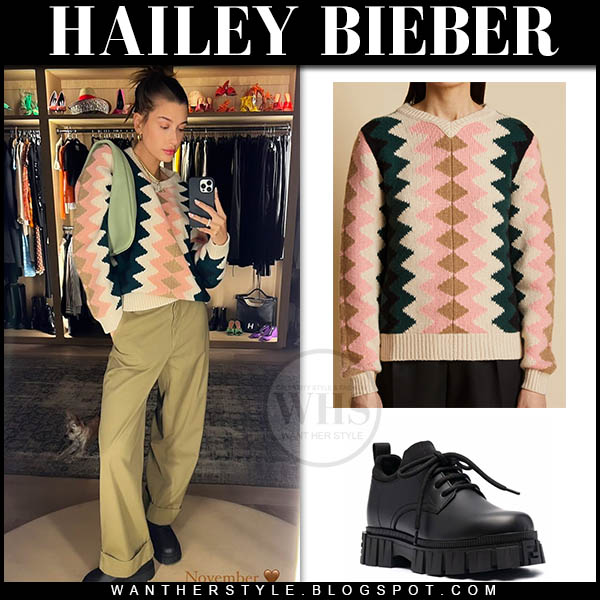 Hailey Bieber in zig zag sweater, green pants and black shoes