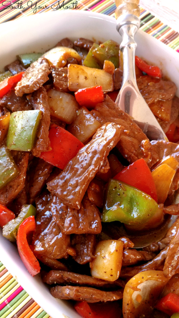 Pepper Steak! A super easy dinner recipe with Asian flare made from stir-fried beef, fresh bell peppers and onions served over rice.
