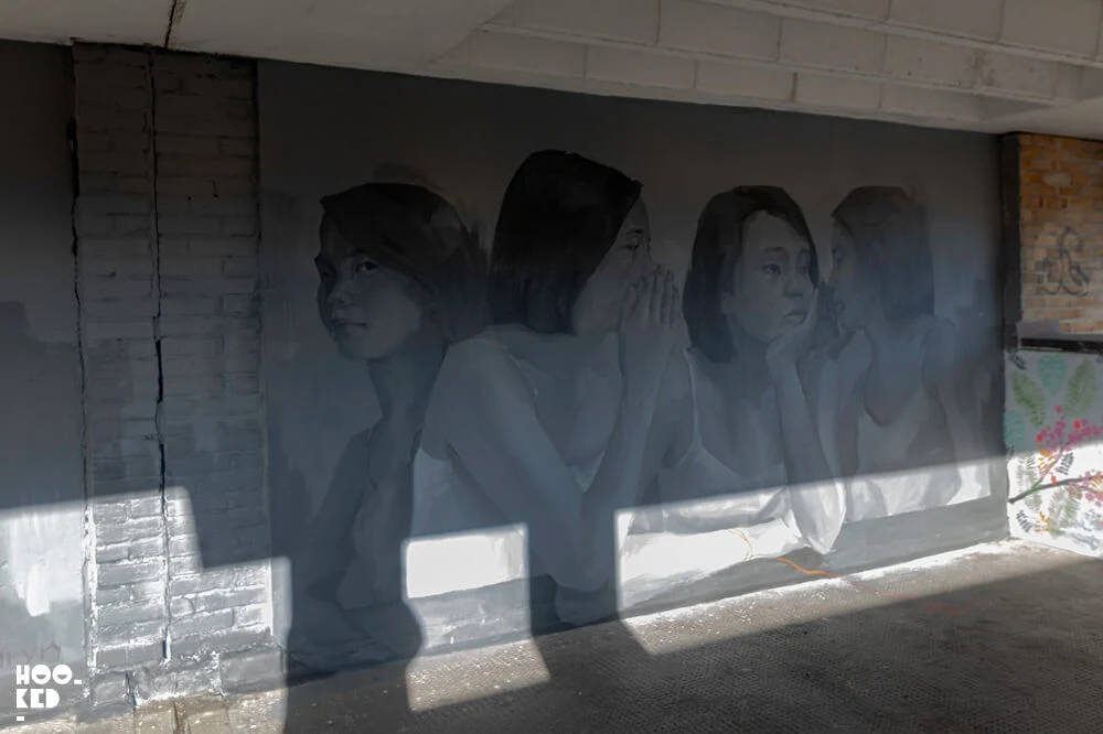 Female artist Caryn Koh mural painted at the Penge Rooftop Outdoor Gallery