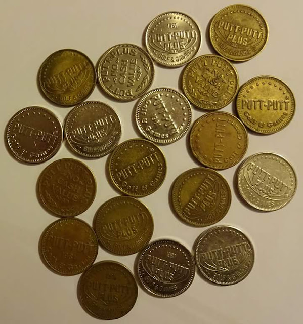 A selection of Putt-Putt tokens