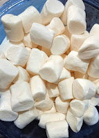 marshmallows ready to be microwaved