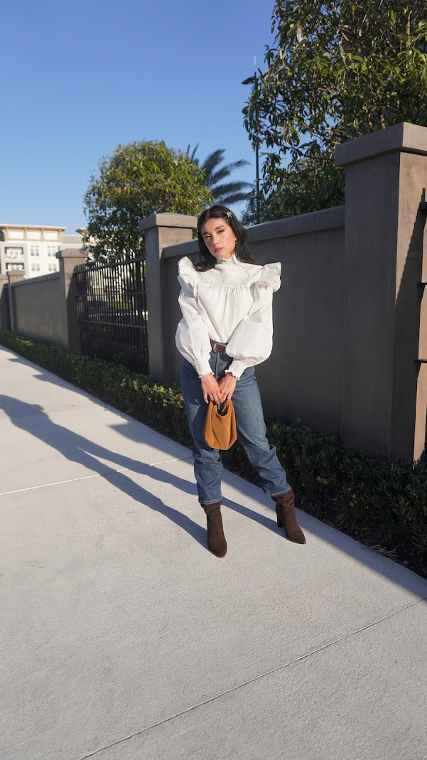 Bridgerton inspired look with jeans and blouse The Wearable Bridgerton Effect Neo-Victorian fashion trend look by Lina Mayorga.