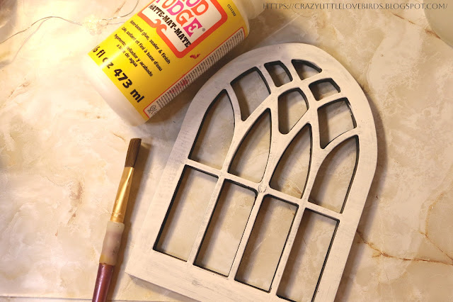 Faux Arched Window Frame with paintbrush and Mod Podge