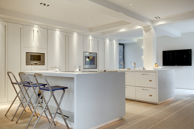 Picture of modern kitchen with minimalist white furniture
