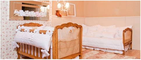 Old european style bedroom for babies with wooden furniture and high tech security systems