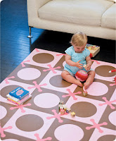 protect baby noggins!  buy a foam playmat!