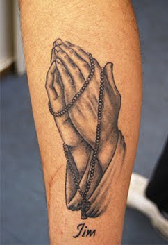 praying hands tattoo