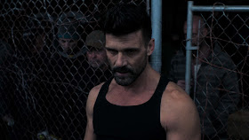 Frank Grillo man in a cage