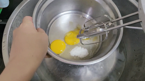 Whisk egg yolks and sugar