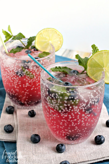 A classic summertime cocktail gets a delicious twist with the addition of fresh blueberries & ginger ale in these refreshing Blueberry Ginger Mojitos.