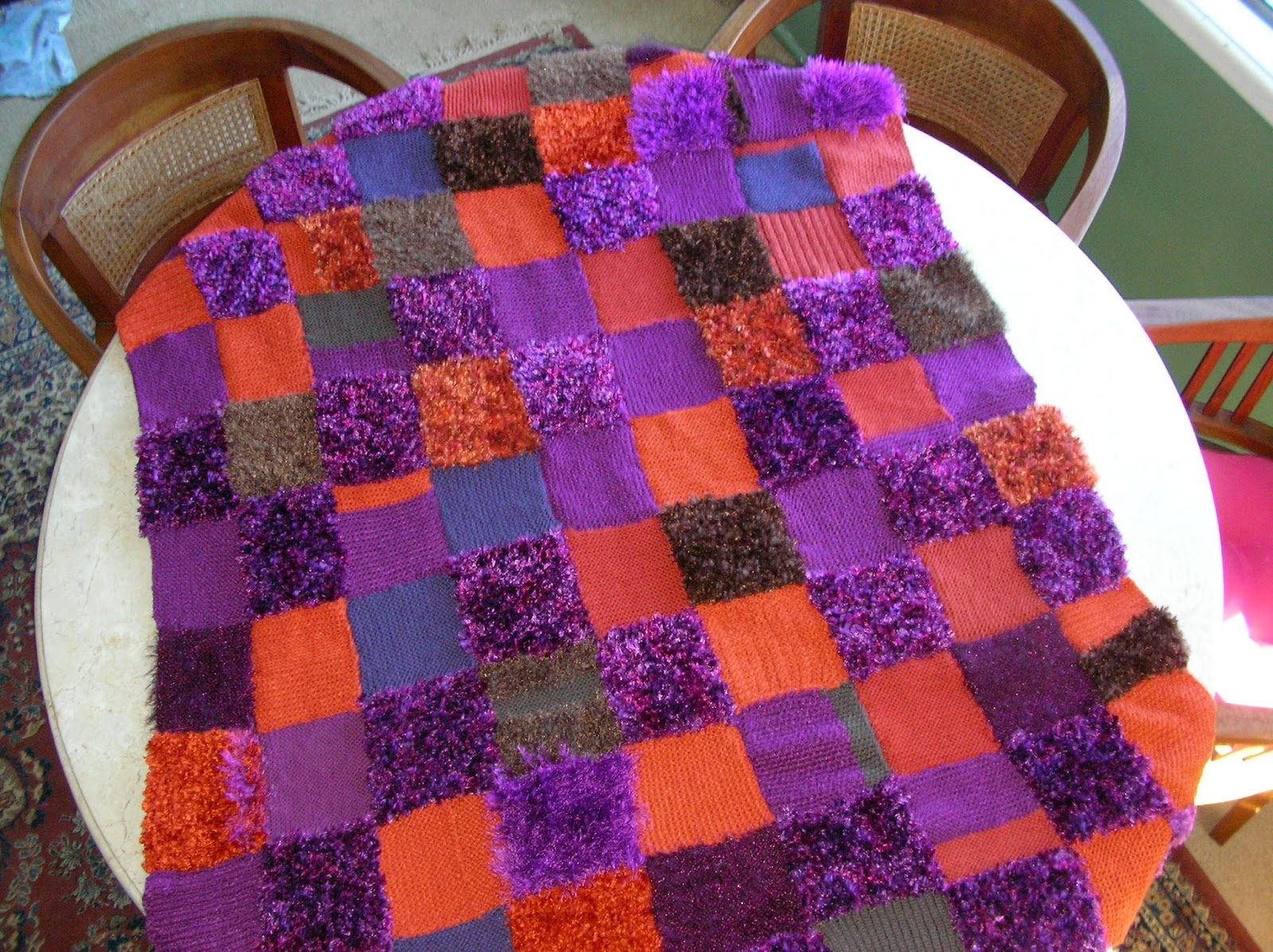 Here's a throw rug I mucked around with years ago to use up some left ...