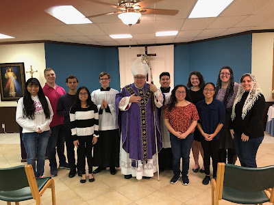 Bishop with UTA students