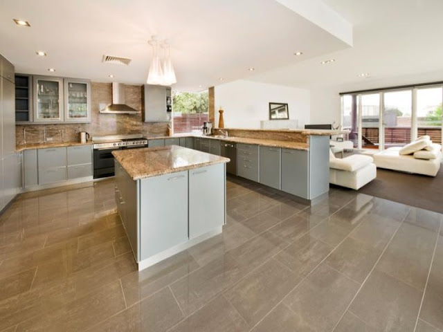 Photo of large modern kitchen inside of amazing modern home