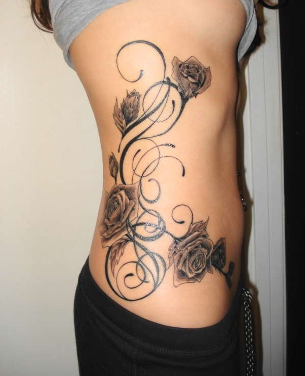 girl tattoos on side