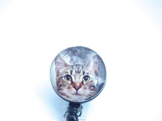 Completed badge reel with photo of kitty