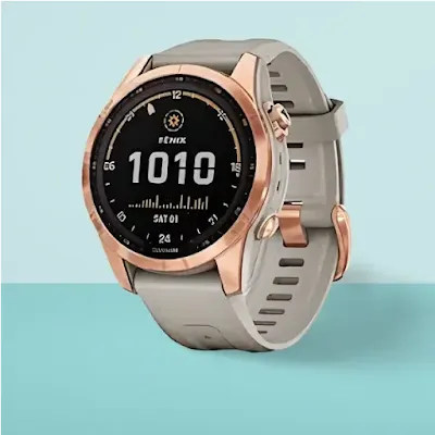 Front view of Garmin Fenix 7S Solar smartwatch with a cyan background