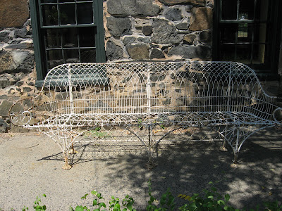 Antique Furniture Baltimore on Shows Antique Garden Furniture In The Store S Stone Courtyard