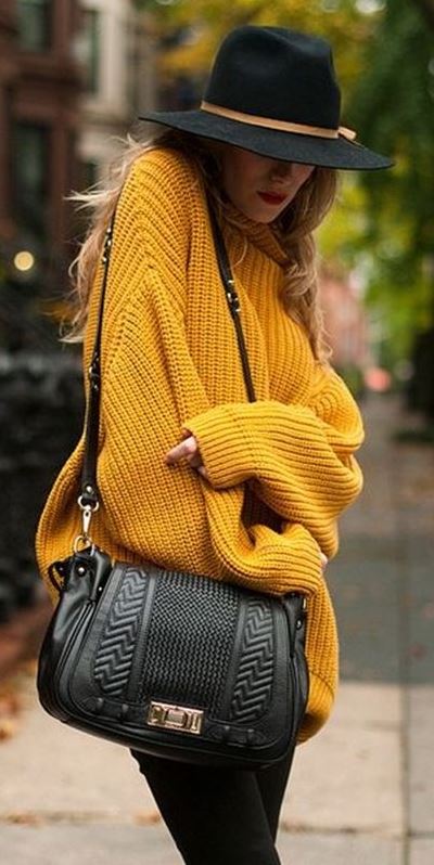 what to wear with a yellow oversized sweater : hat + bag + black skinnies