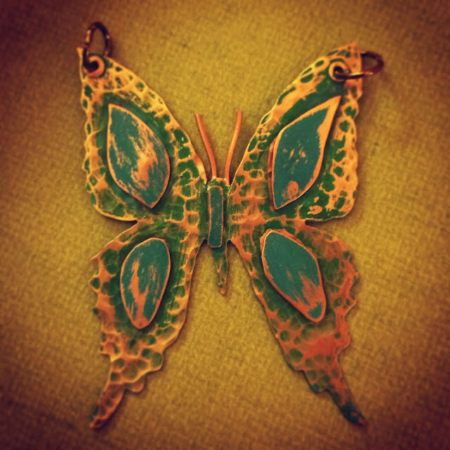 Copper Butterfly with green patina and texture added to it