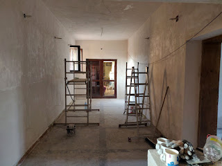 Library first coat plastering done