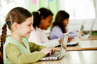 girl using laptop