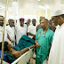 Pres. Buhari visits Abuja bomb blast victims, pays bill of girl shot by armed robbers-photos