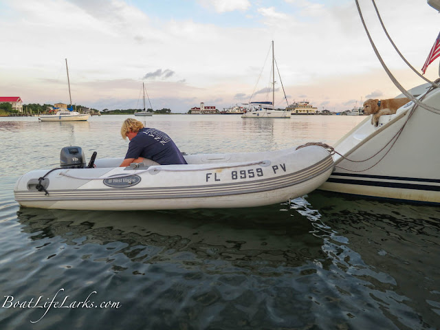 Fixing the dinghy in Silver Lake, Ocracoke