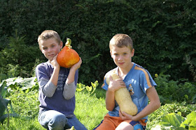 Harvesting pumpkins with my family