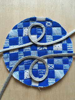 bias tape glued on quilted circles