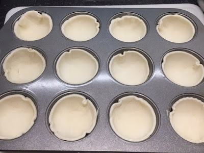 raw pastry in a cupcake tray