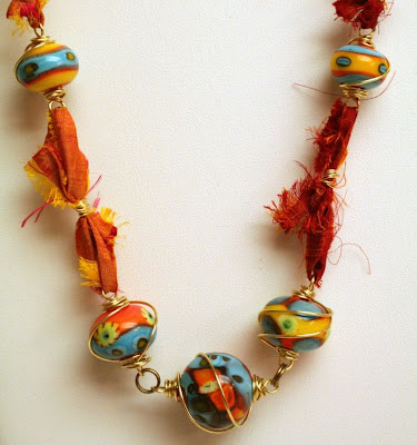 Summer heat: lampwork by Cherry Obsidia, brass wire, sari silk, wire-wrapping, ooak necklace :: All Pretty Things