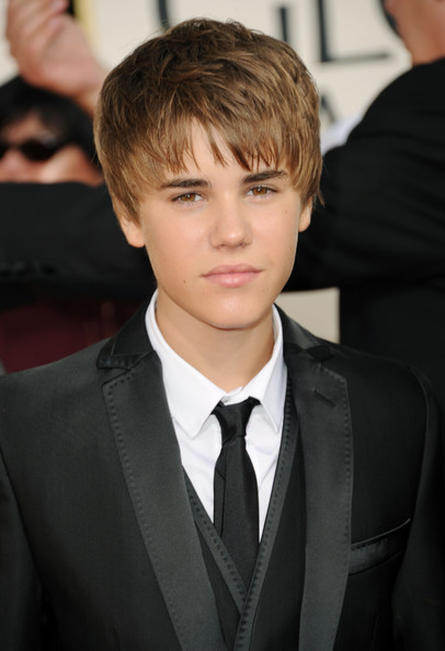 justin bieber haircut april 2011. justin bieber puberty hair.