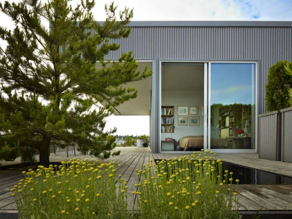 The Silver Metal Sky House Minimalist Design