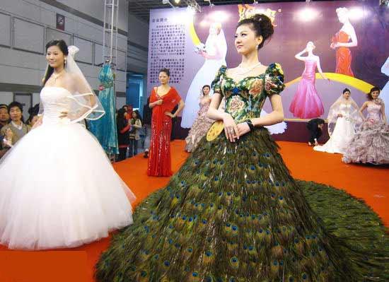 white peacock wedding dress