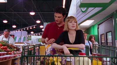 Jack and Jen grocery shopping on a studio set