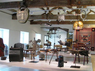 Room with collection of folk objects