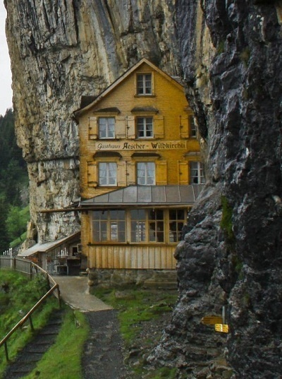  14 Crazy Hotels That Will Give You Serious Travel Goals - Äscher Cliff in Switzerland sits right on the edge of a steep cliff, a perfect getaway for travelers who like a little bit of riskiness (not to mention hiking) with their overnight stay.