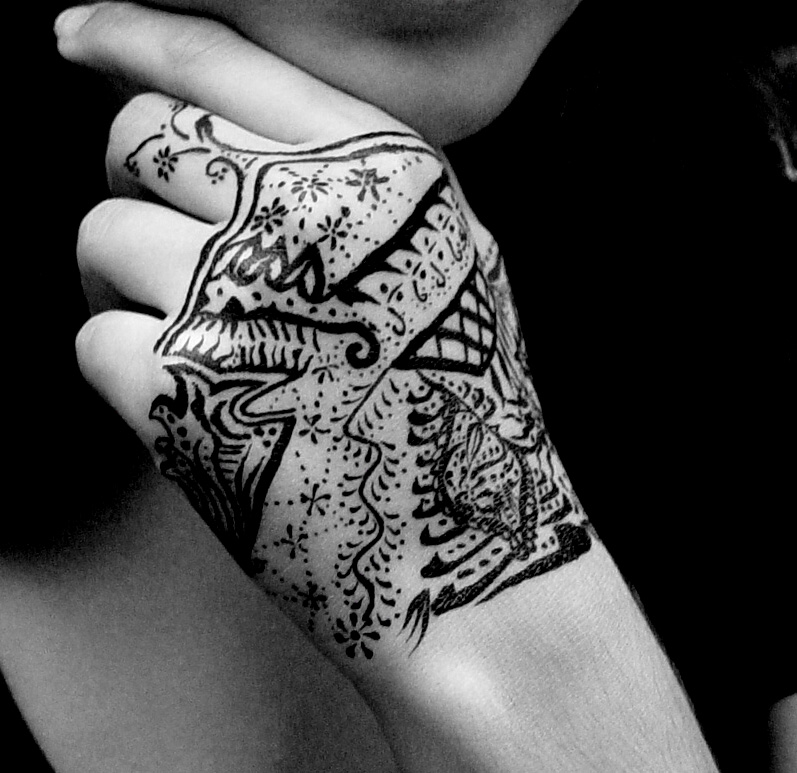 tribal hand tattoos. hand tattoo designs.