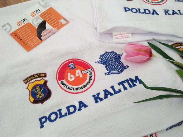 souvenir promosi handuk bordir pesanan Polda Kaltim